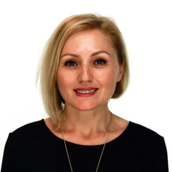 Dr. Adela Coku